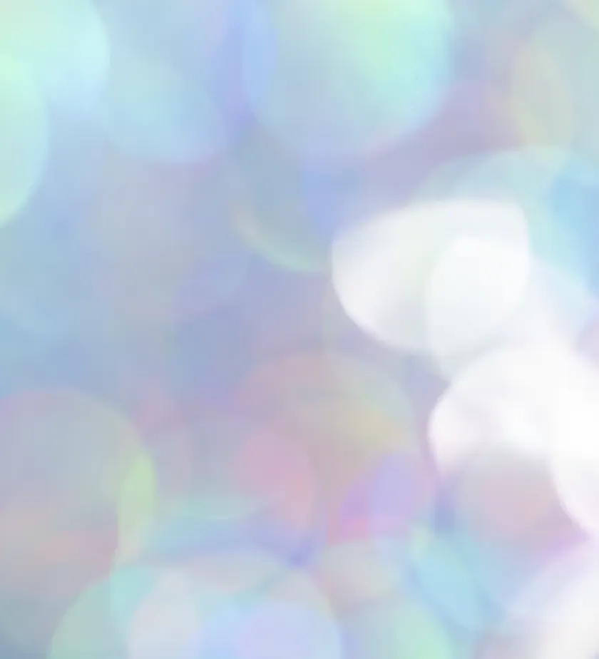 Halos de lumière pâles et nacrés en flou d'arrière-plan